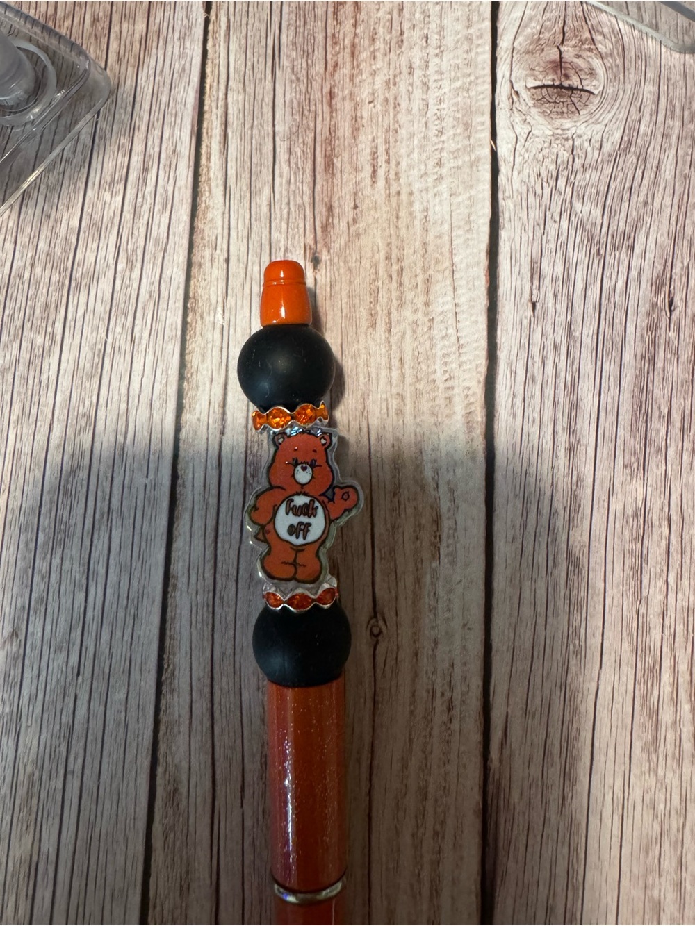 Orange swear bear pen